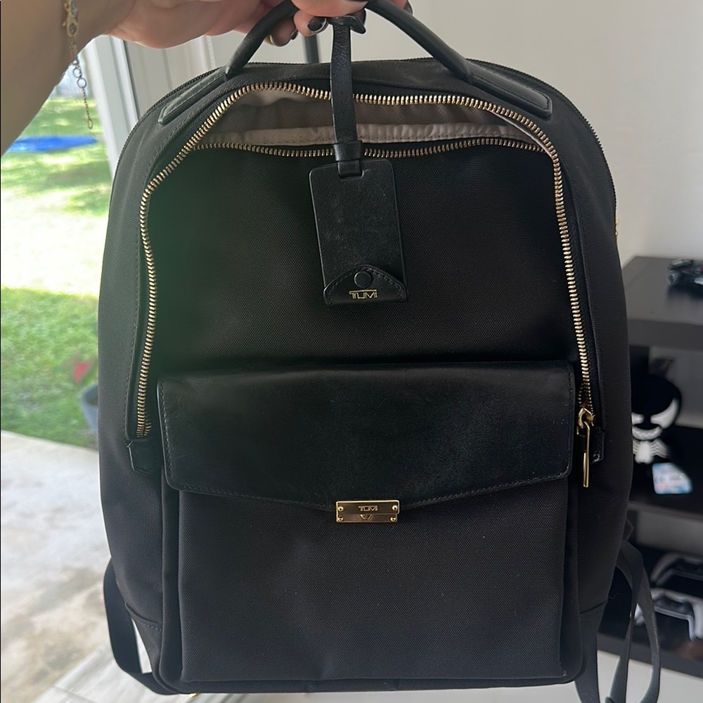 Tumi backpack. Black nylon, laptop bag.